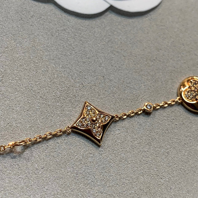 STAR AND SUN 4 MOTIFS GOLD DIAMONDS BRACELET