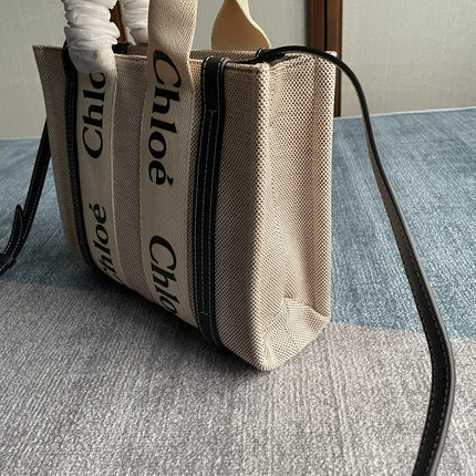 SMALL STRAP WOODY TOTE BAG 26.5 IN BEIGE LINEN CANVAS BLACK WEBBING LOGO EMBROIDER BLACK CALFSKIN