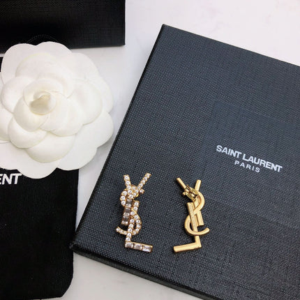 YSL 26S BAGUETTE CRYSTAL LOGO DROP EARRINGS IN GOLD TONE METAL 629136