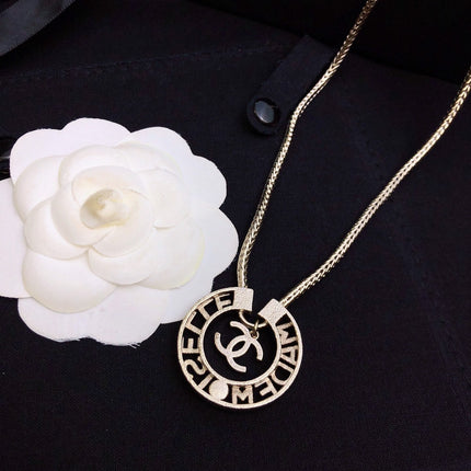 CHANEL 26S CHANEL CC LOGO MADEMOISELLE ROUND NECKLACE IN GOLD METAL 633322