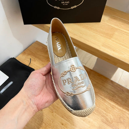 PRADA 26S EMBROIDERED LOGO ESPADRILLE FLATS IN SILVER CALFSKIN