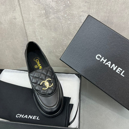 CHANEL 26S LOAFERS IN BLACK QUILTED CALFSKIN WITH CC LOGO