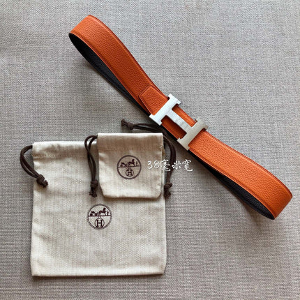 HM BELT BUCKLE & REVERSIBLE BLACK AND ORANGE LEATHER STRAP 38MM SILVER HARDWARE