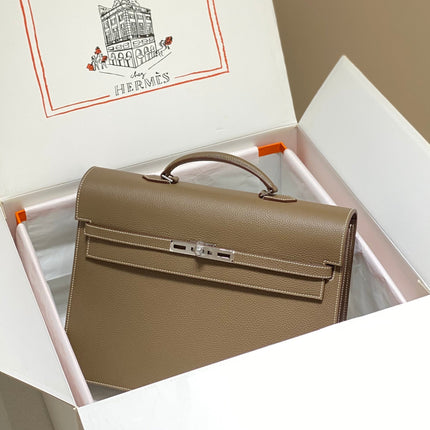 KELLY DEPECHES 38 BRIEFCASE IN ETOUPE TOGO CALFSKIN SILVER HARDWARE