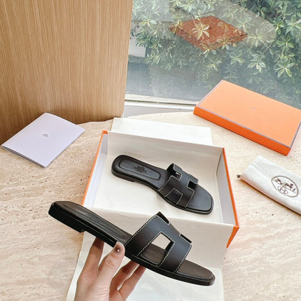 0RAN SANDAL IN BLACK CALFSKIN 202622