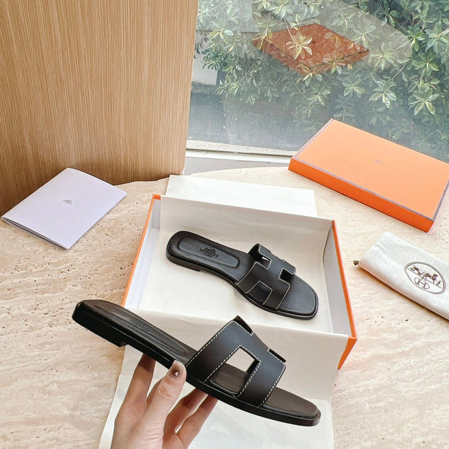 0RAN SANDAL IN BLACK CALFSKIN 202622
