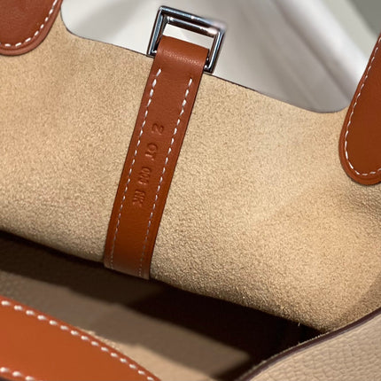 HERMES 25S PICOTIN LOCK 18 IN BURNT ORANGE AND LIGHT BROWN CALFSKIN SILVER HARDWARE