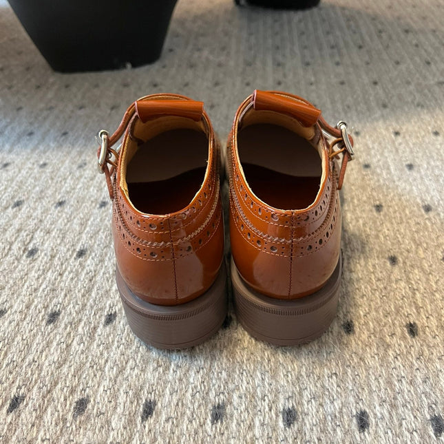 MIUMIU 26S CHURCH BROGUE MONK STRAP SHOES IN RUST ORANGE PATENT CALFSKIN