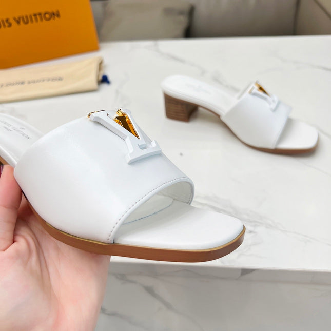 LV 26S CAPRI HIGH-HEELED MULES IN WHITE CALFSKIN