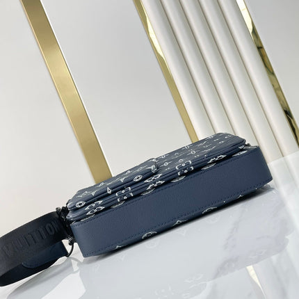 TRIO MESSENGER 25 IN PRUSSIAN BLUE MONOGRAM SHADOW CALFSKIN