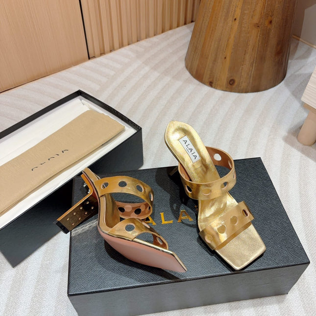 ALAIA TWO-STRAPS HIGH HEEL SANDALS IN GOLDEN PATENT LAMBSKIN