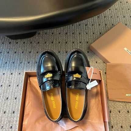 MIUMIU 26S PENNY LOAFERS IN BLACK SHINY CALFSKIN