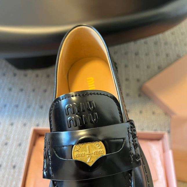 MIUMIU 26S PENNY LOAFERS IN BLACK SHINY CALFSKIN