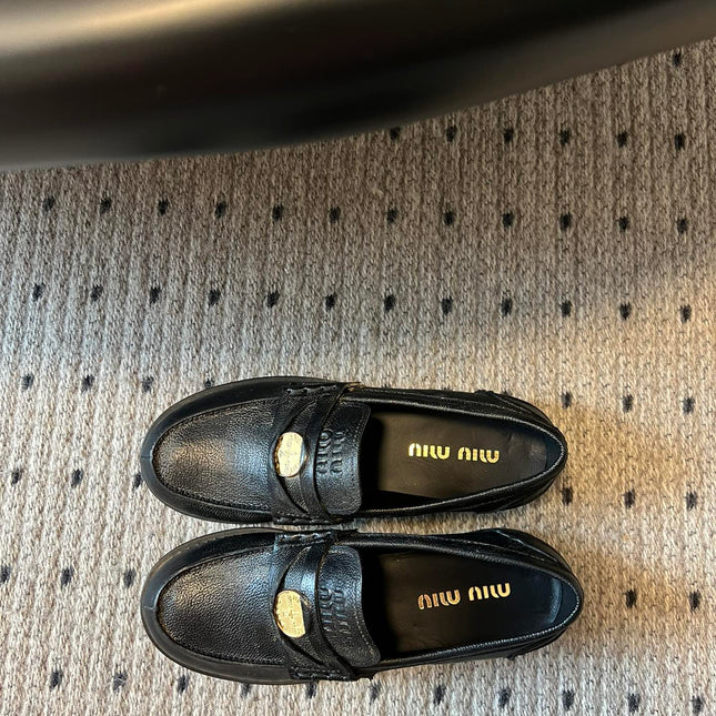 MIUMIU 26S PENNY LOAFERS IN BLACK CALFSKIN GOLD HARDWARE