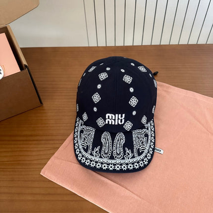 MIUMIU BASEBALL CAP IN BLACK WITH WHITE EMBROIDERED PATTERN