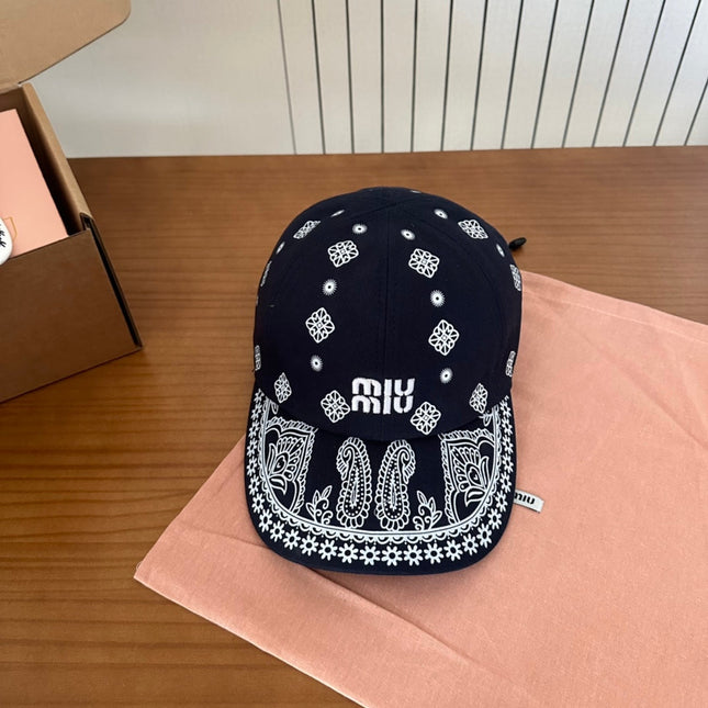 MIUMIU BASEBALL CAP IN BLACK WITH WHITE EMBROIDERED PATTERN