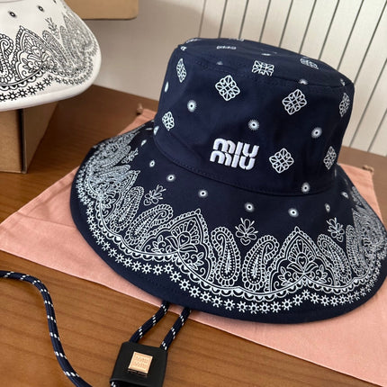 MIUMIU BUCKET IN BLACK FABRIC WITH EMBROIDERED PATTERN