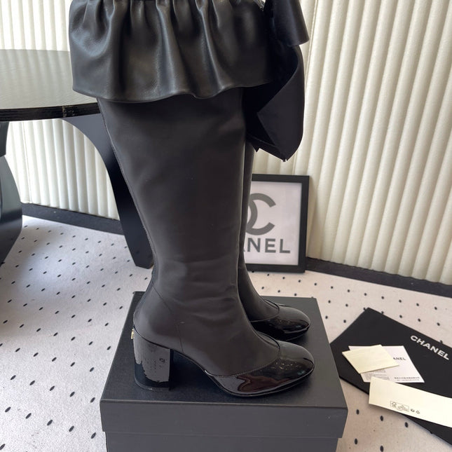 CHANEL BOW HIGH BOOTS IN BLACK CALFSKIN