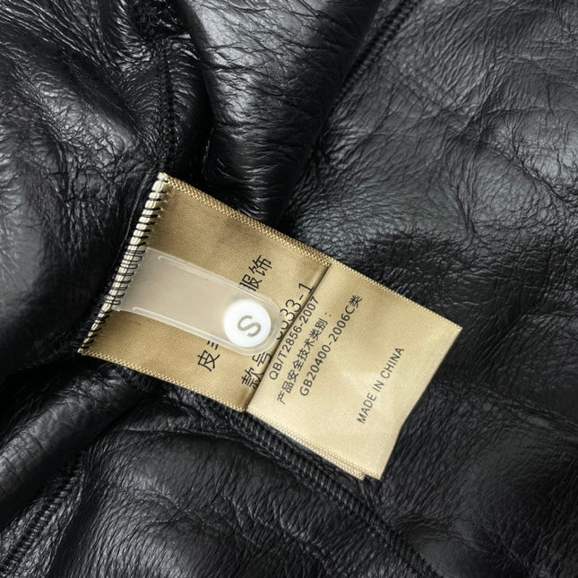YSL 25S SHORT-SLEEVED SHEARLING COAT STYLE 231