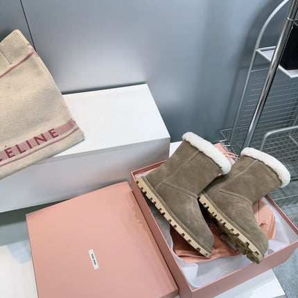 MIUMIU 25S BOOTIES IN DARK BROWN SUEDE AND SHEARLING