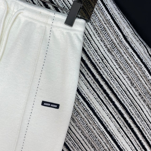 MIUMIU WIDE-LEG PANTS STYLE 653