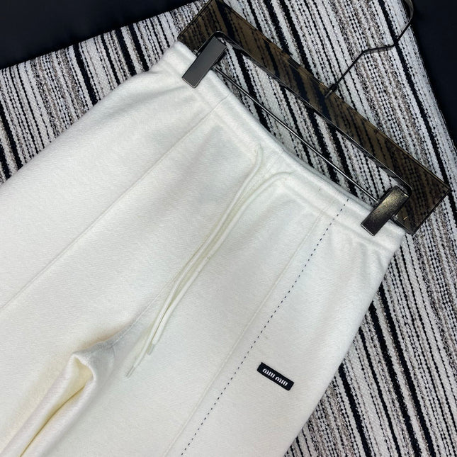 MIUMIU WIDE-LEG PANTS STYLE 653