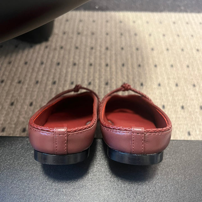 BOTTEGA VENETA 26S FLAT MULES IN DARK RED LAMBSKIN