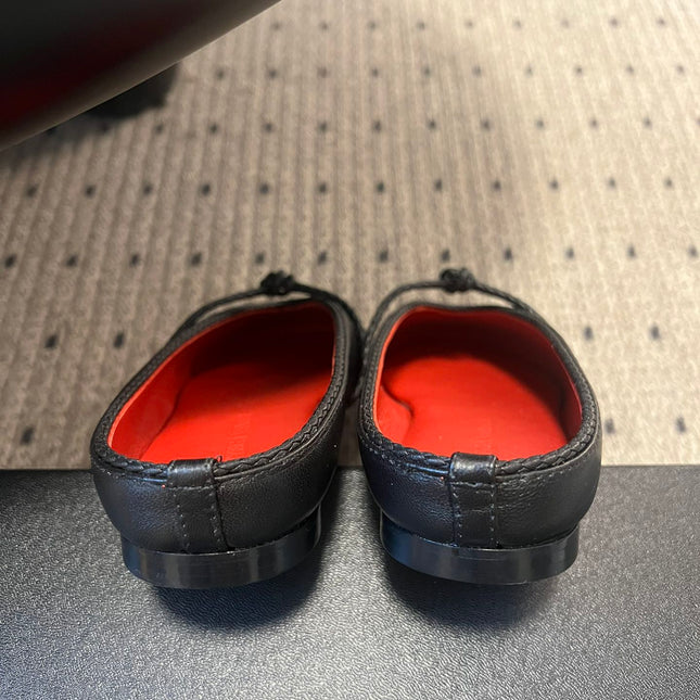 BOTTEGA VENETA 26S FLAT MULES IN BLACK LAMBSKIN