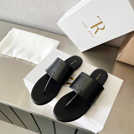 THE ROW 26S FLAT THONG SANDALS IN BLACK CALFSKIN
