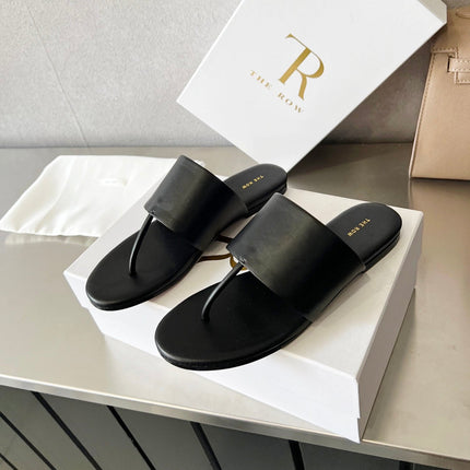 THE ROW 26S FLAT THONG SANDALS IN BLACK CALFSKIN
