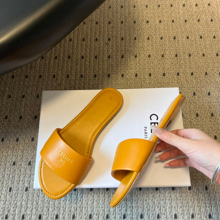 CELINE 26S FLAT SLIDES IN HONEY YELLOW LAMBSKIN