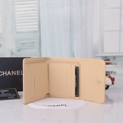 CHANEL FLAP CARD HOLDER IN BEIGE CAVIAR CALFSKIN WITH CRYSTAL EMBOSSED LOGO