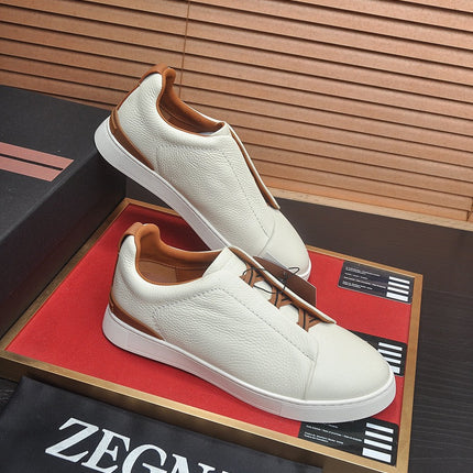 LOW-TOP SNEAKERS IN WHITE GRAINED CALFSKIN