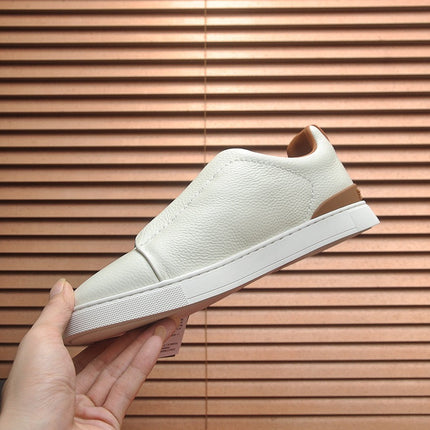LOW-TOP SNEAKERS IN WHITE GRAINED CALFSKIN