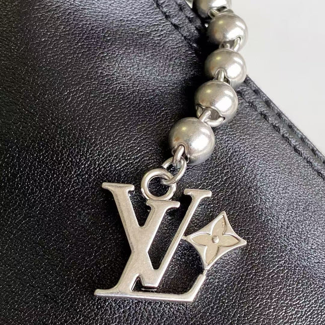 LV SHOULDER BAG 48 IN BLACK CALFSKIN EMBOSSED STRAP