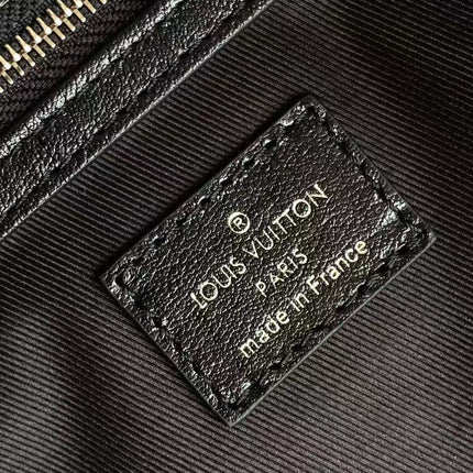 LV SHOULDER BAG 48 IN BLACK CALFSKIN EMBOSSED STRAP