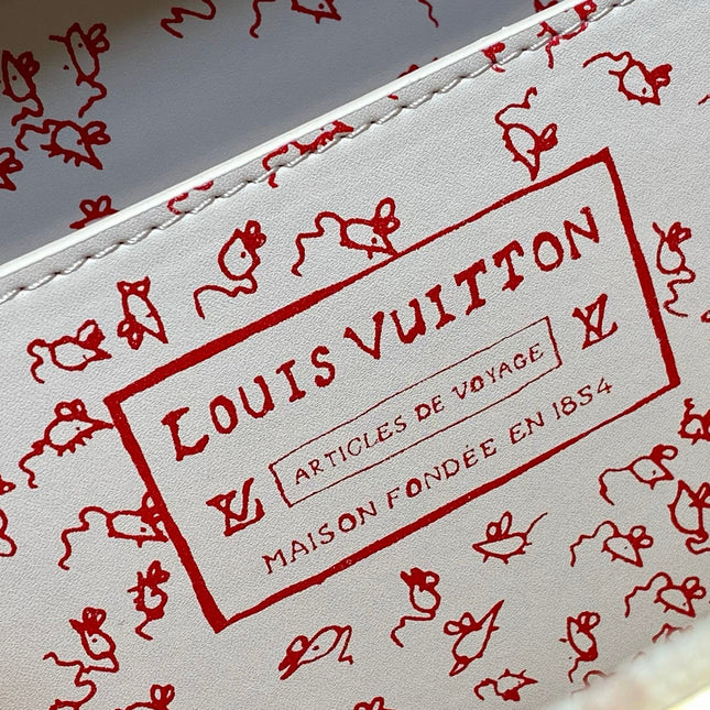 LV TRUNK 22 IN LIGHT PINK CANVAS GOLD HARDWARE
