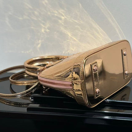 SPEEDY 23 IN GOLD MONOGRAM EMBOSSED CALFSKIN