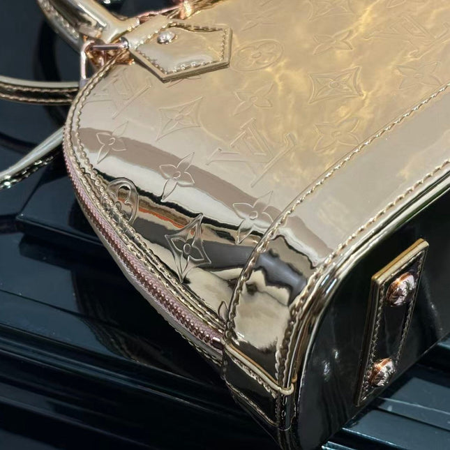 SPEEDY 23 IN GOLD MONOGRAM EMBOSSED CALFSKIN