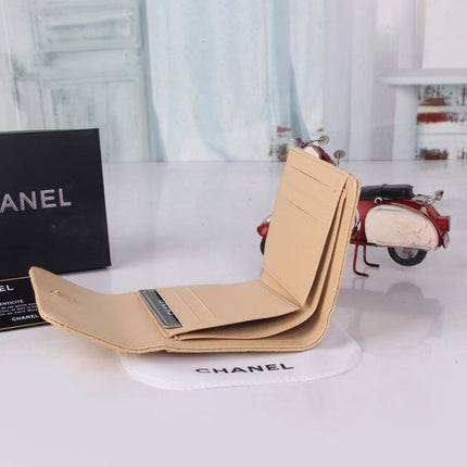 CHANEL FLAP CARD HOLDER IN BEIGE CAVIAR CALFSKIN WITH CRYSTAL EMBOSSED LOGO
