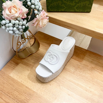 HIGH 10CM WEDGE SANDALS IN WHITE SHEEPSKIN