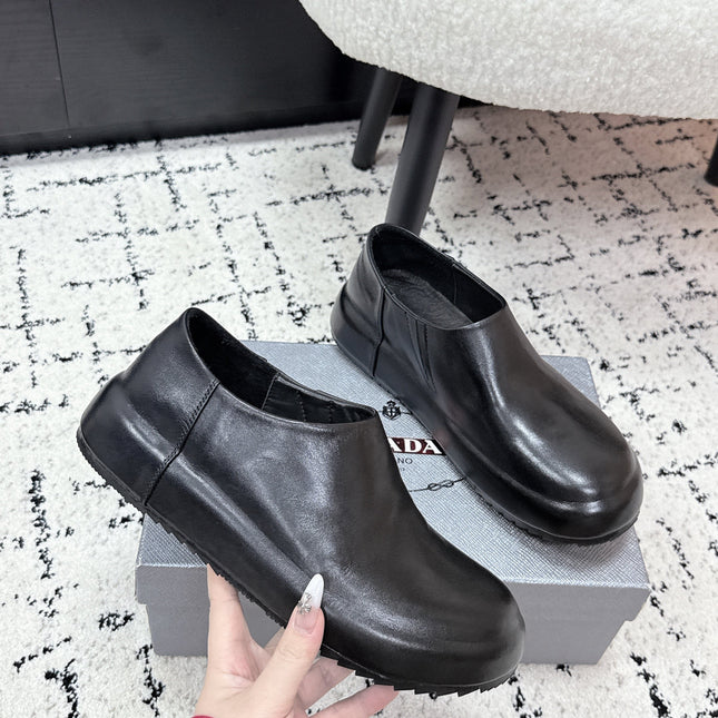 PRADA 26S SLIP ON SHOES IN BLACK SMOOTH CALFSKIN