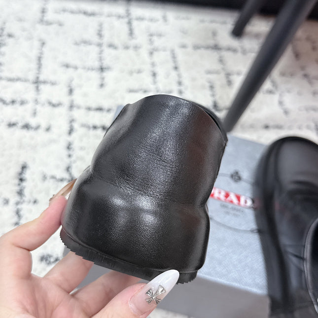 PRADA 26S SLIP ON SHOES IN BLACK SMOOTH CALFSKIN