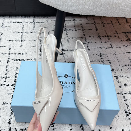 PRADA 26S SLINGBACK PUMPS 60MM IN CREAM WHITE PATENT CALFSKIN