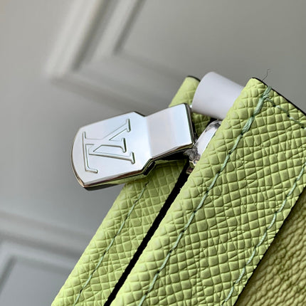 POCHETTE VOYAGE 26 IN LEMON YELLOW MONOGRAM ECLIPSE CALFSKIN