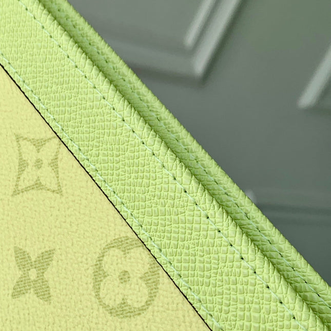 POCHETTE VOYAGE 26 IN LEMON YELLOW MONOGRAM ECLIPSE CALFSKIN