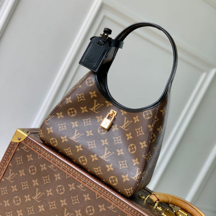 THE DROP PM 28 IN BROWN MONOGRAM COATED CANVAS AND CALFSKIN
