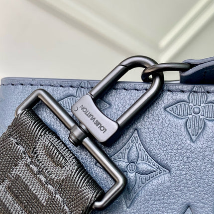 POCHETTE VOYAGE 22 IN DARK BLUE MONOGRAM SHADOW CALFSKIN