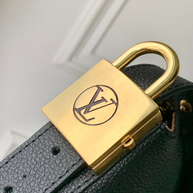 LOW KEY COOKIE MM 32 IN BLACK CALFSKIN BROWN MONOGRAM TAG