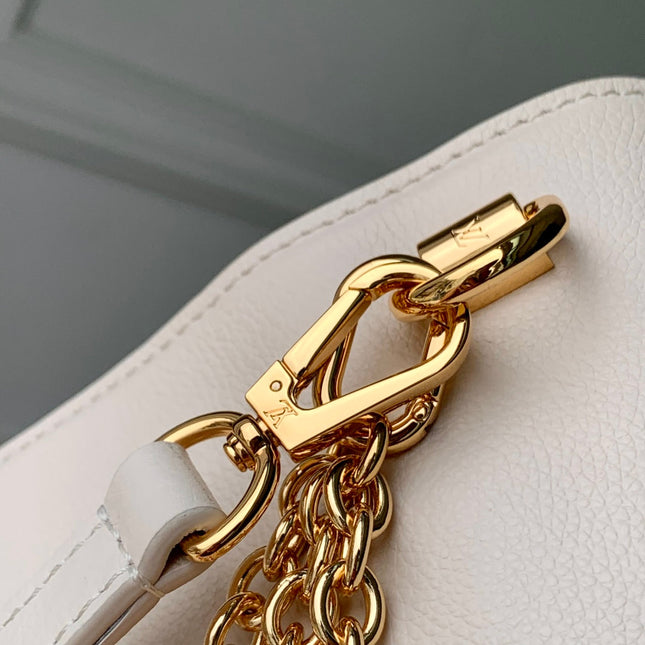 TWIST SLIM 19 IN LIGHT PINK TAURILLON CALFSKIN GOLD HARDWARE